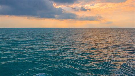 Nx09 Sunny Sea Sunset Ocean Water Nature Wallpaper