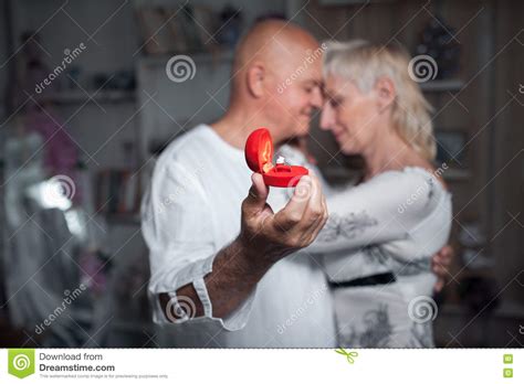 How to propose a senior boy. Senior Man Making Proposal To Older Woman; Stock Photo ...