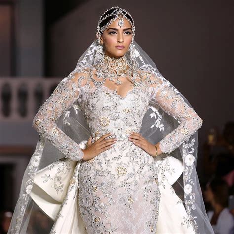 Sonam Kapoor looks like a white heavenly princess in PFW ... Have a look at sonam kapoor's bridal avatar: