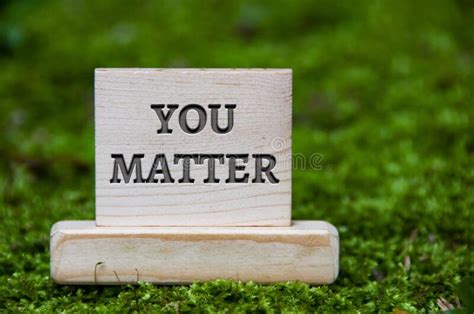You Matter Text On Wooden Block With Green Nature Background