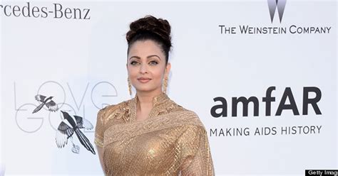 Aishwarya Rais Cannes 2013 Gold Gown Stuns At Amfar Event Photos