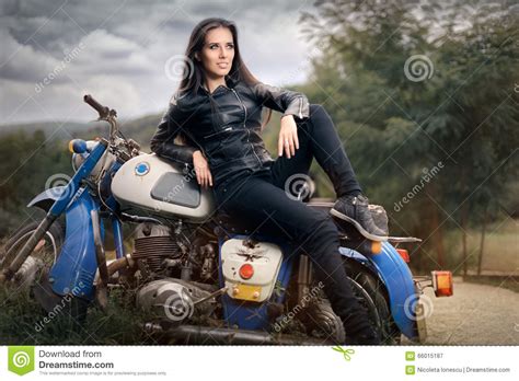 Biker Girl In Leather Jacket On Retro Motorcycle Stock