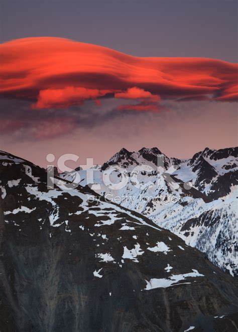 Mountain Landscape With A Lenticular Cloud Stock Photos