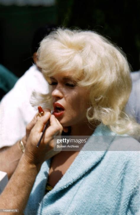 jayne mansfield having lipstick applied to face behind the scenes on news photo getty images