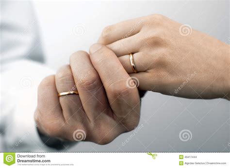 Joanne wedding rings wedding cake: Man's And Woman's Hands With Wedding Rings Stock Photo ...