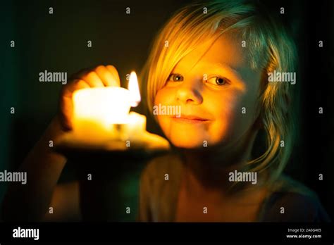 Little Girl Lighting Candles Hi Res Stock Photography And Images Alamy