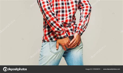 Man Suffering Hemorrhoids Anal Problems Male Holds His Hands Ass Stock Photo By Facesportrait