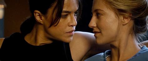 Michelle Rodriguez Making Out With Caitlin Gerard In “the Assignment