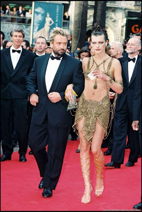 Milla Jovovich With Luc Besson In A Sheer Dress With Bustier And Loincloth Style Skirt Inspi