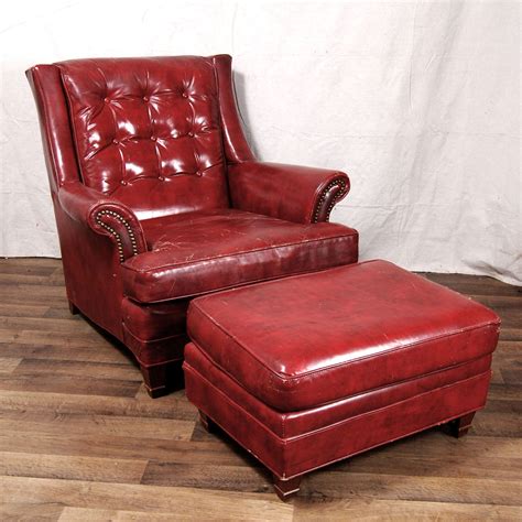A classic martino black leather chair and ottoman is ideal for most rooms, providing a touch of minimalist chic, and being comfortable enough to sink into after a long day. Leather Chair And Ottoman #LeatherChair | Chair and ottoman
