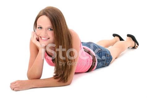 David prado / addictive creative; Beautiful Fourteen Year Old Girl Laying on Floor Stock ...