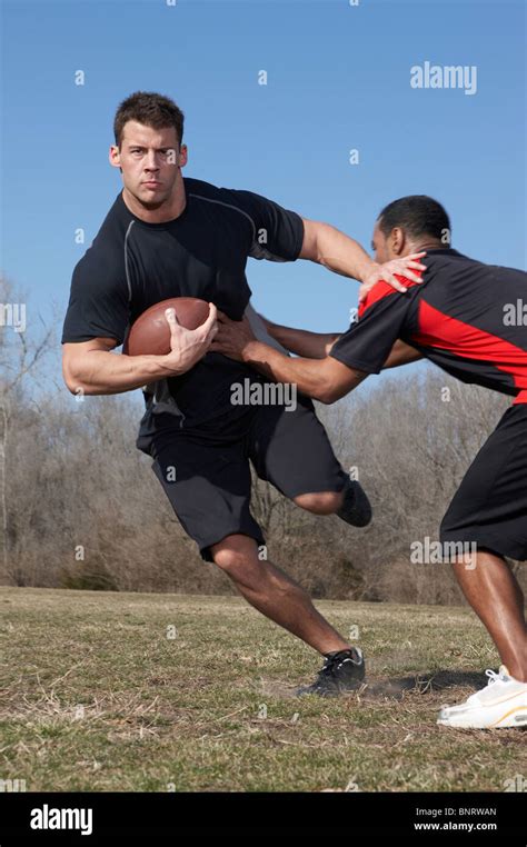 A Running Play In A Touch Football Game Stock Photo Alamy