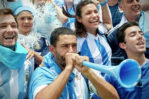 Argentinian Football Fans Watching Football Match Stock Photo Dissolve