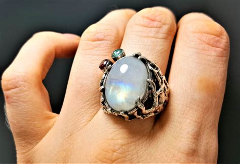 It is made of sterling silver, polished and inlaid with round cubic zirconia. STERLING SILVER 925 Natural Moonstone Ring Genuine Garnet ...