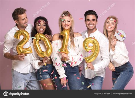 Group Beautiful Young People Celebrating New Year 2019 — Stock Photo © NeonShot #212651954