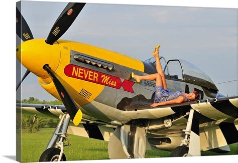 1940s Style Pin Up Girl Lying On The Wing Of A P 51 Mustang Wall Art