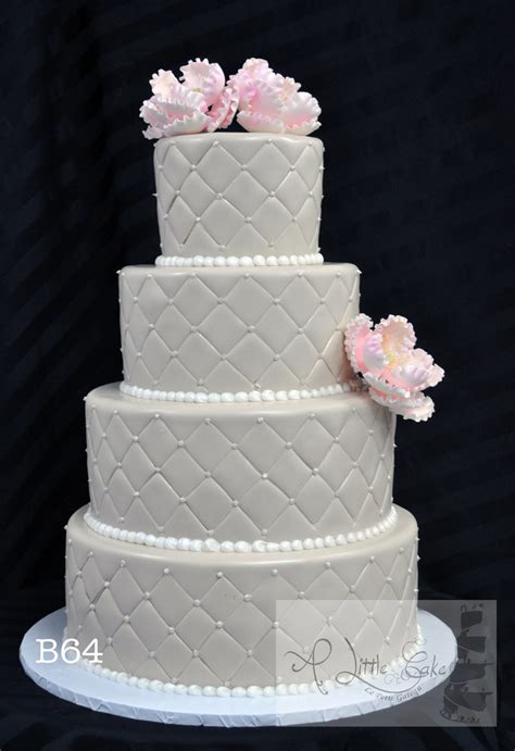 B64 Off White Fondant Wedding Cake With Pink Flowers And Beads