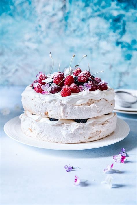 Both meringue and pavlova are egg white desserts, and are made in a similar way. Two layers of meringue filled with softly whipped cream ...