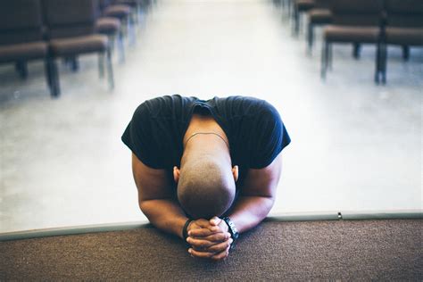Praying On Knees At Church