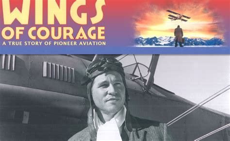 A Man Standing In Front Of An Airplane With The Words Wings Of Courage On It