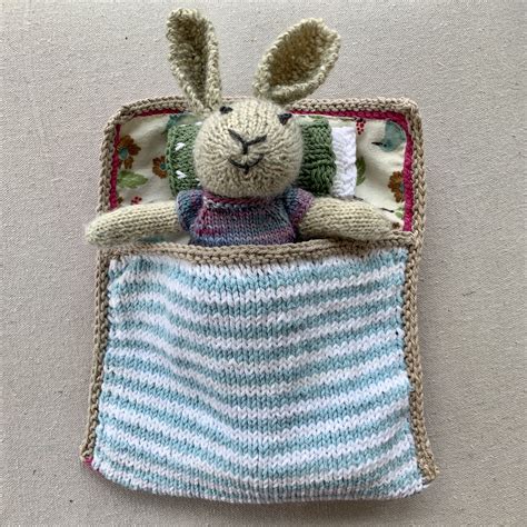 Bunny Sleeping Bag Pattern - Emily Andrew Knits | Sleeping bag pattern, Knitted sleeping bag ...