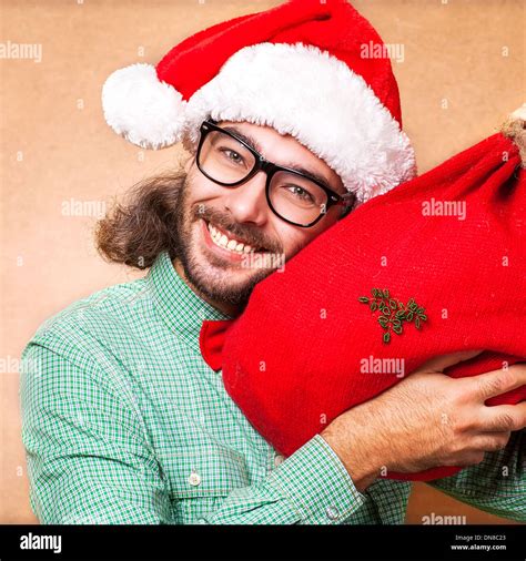 Hipster Santa Claus With The Bag Of The Presents Shows Class Stock
