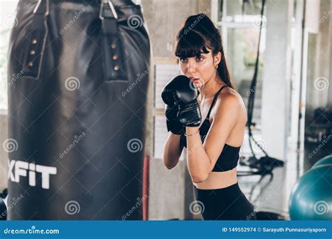 Female Boxer Punching Bag Stock Photo Image Of Concentrated 149552974