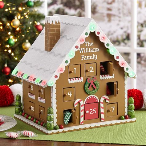 Gingerbread lodge with light from the window in winter. Limited Edition Lighted Gingerbread House Advent Calendar ...