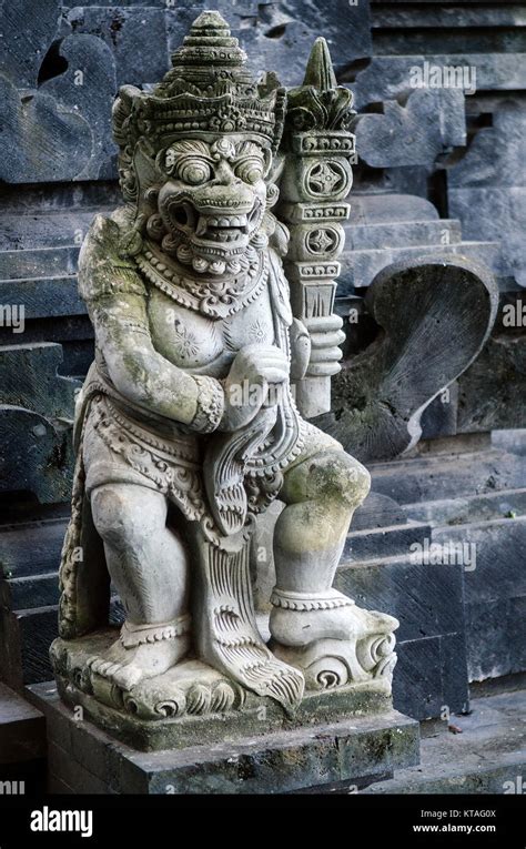Traditional Ancient Balinese Hindu Statues In Bali Temple Indonesia