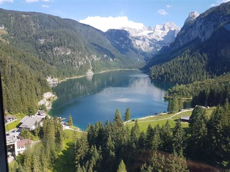 Full View Of Lake Gosau Austria Surrounded By Mountains Stock Photo