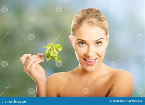 smiling nude woman holding a fork with lettuce stock image image of female bowl 58962063
