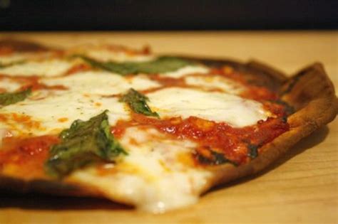 This homemade stuffed crust pizza is a chewy garlic bread crust on the outside, and gooey mozzarella cheese inside, and couldn't be simpler. Flatbread Margherita Pizza Recipe with Homemade Sauce and Fresh Basil