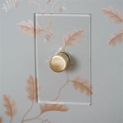 Inspired by 1930s glass switches, they are pioneers of the invisible lightswitch® that blends in with its surroundings. High Street Market: The Clear Switch: Forbes & Lomax