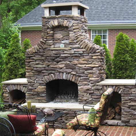 Here is a basic summary of how to build a fireplace outdoors. A Custom Stone Outdoor Fireplace by Select | Family Leisure
