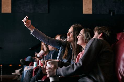 Movies Friends Take Selfie In Theater Before Movie By Stocksy Contributor Sean Locke Stocksy