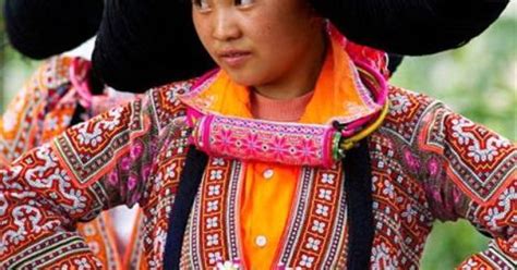 A Woman From The Long Horn Miao Tribe Wears A Ceremonial Hairpiece