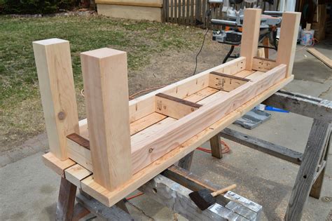 A feature that adds to the strength of the seat is the dowels that run through it. Simple Indoor/Outdoor Rustic Bench Plan | Wooden bench ...