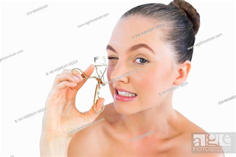 Pretty Woman Curling Her Eyelashes Stock Photo Picture And Low Budget Royalty Free Image Pic