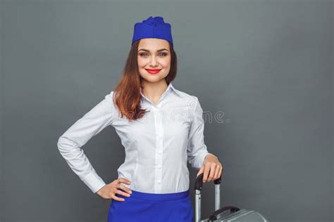Professional Occupation Stewardess Standing On Grey With Suitcase