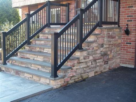 Use a tape measure to determine the length of the concrete and to decide where each of the posts of the railing will be positioned. Suffolk Concrete & Masonry, Inc. - Home | Front porch steps, Porch steps, Front porch railings