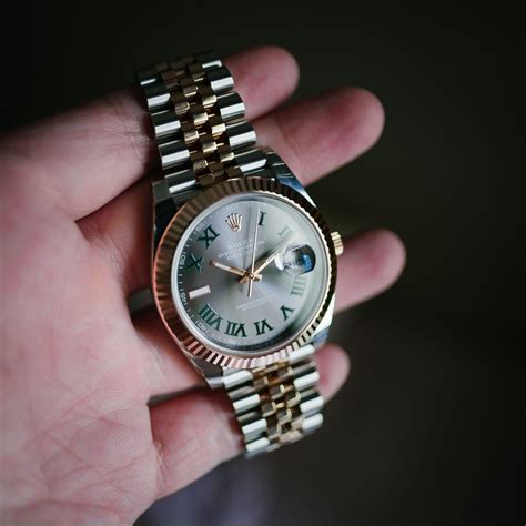 Created in 1945, the datejust was the first this particular model features the stunning slate grey wimbledon dial with green outlined black roman numeral hour markers, an oystersteel case, smooth bezel and jubilee bracelet. Rolex Datejust 41 Wimbledon rose gold 126331, Luxury ...