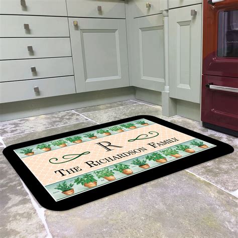 These dish mats are fabricated from an ultra absorbent foam core, and will protect fragile dishes while supporting larger cookware. Personalized Monogram Kitchen Mat