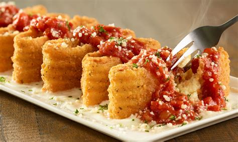Our famous house salad (150 cal per serving), breadsticks (vegetarian options) (140 cal each) and your choice of homemade soup. Get a FREE Appetizer or Dessert at Olive Garden With ...