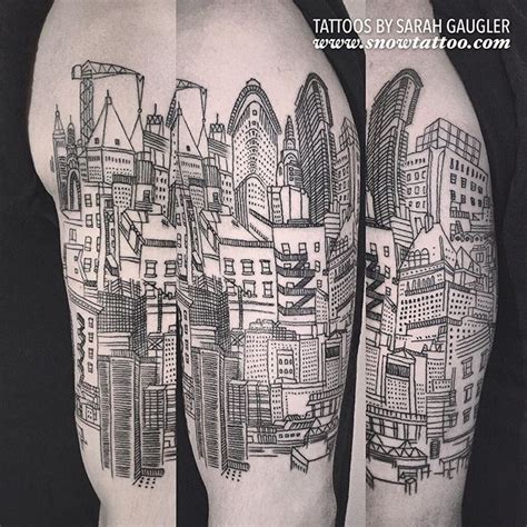 The Back Of A Man S Thigh With Cityscape Tattoos On His Legs