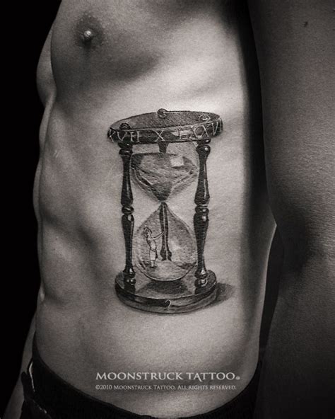 Black And Grey Ink Hour Glass Tattoo Photo 1 Hourglass Tattoo Tattoos Hourglass Tattoo Meaning