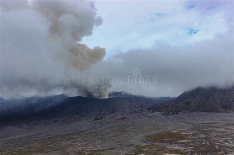 Mount Bromo In Eruption White Smoke Covered The Mountain Peak