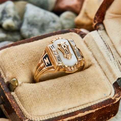 This Vintage 1961 Class Ring Is Centered With A Mother Of Pearl Gem