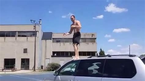 Man Jumps On Top Of Minivan Jukin Licensing