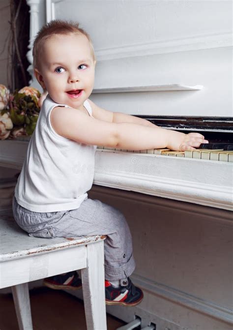 Baby Playing The Piano Stock Photo Image Of House Artistic 70024982