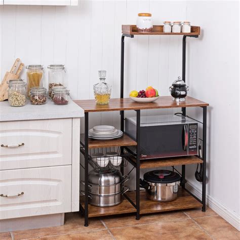 A helping hand, this towel pole has a weighted base so that it stays in place, dispensing as much kitchen paper as required. Latitude Run® Oroville 4-tier Vintage Kitchen Baker's Rack ...